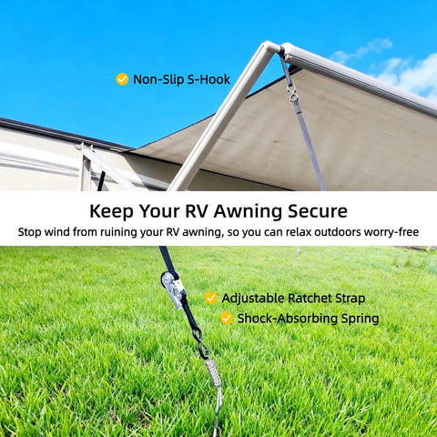 RV Awning Tie Down Kit With Shock Absorbing Springs And 13ft Ratchet Straps securing an awning on grass with blue sky background