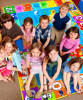 Children sitting on Interactive World Map Kids Rug for Playroom and Classroom 110 By 78.7 Inches Educational Geography Carpet.