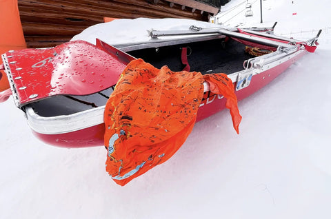 Yosemite Map Survival Bandana And Grab-and-Go Emergency Navigation Scarf on snow-covered red boat, blaze orange color with map print.
