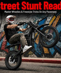 Heavy Duty Off Road Electric Dirt Bike With A Beast Mode 60V 30Ah Battery And 6000W Peak Motor performing a wheelie on pavement.