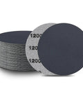 Super Awesome 1200 Grit Sanding Discs With Hook and Loop Fastener Perfect For Detailing And Smoothing Projects Featuring Wear Resistant Silicon Carbide Construction That Lasts Great Value Pack, 1200 grit discs in a stack.