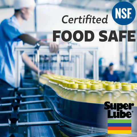 Factory worker in blue uniform near bottling line labeled 'Certified Food Safe NSF' for Garage Ready High Temp Multi Purpose Synthetic Grease