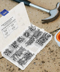 260 Piece M5 Nut Bolt And Washer Assortment Kit with Carbon Steel Spring Lock Washers on ground with hammer