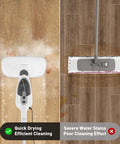 Heavy Hitting 10 In 1 Steam Mop With Detachable Handheld Unit and 3 Reusable Microfiber Pads in action on wood floor.