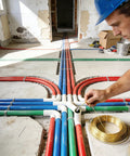 High Grade Spring Steel Fish Tape Wire Puller For Drywall And Concrete Conduit 16 4 Foot Slick Wire Snake in use for cable routing.
