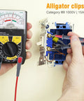 Hands using Soft Silicone Test Lead Kit With Threaded Safety Alligator Clips on a wall socket with multimeter, compatible with Fluke, AstroAI, KAIWEETS, Innova