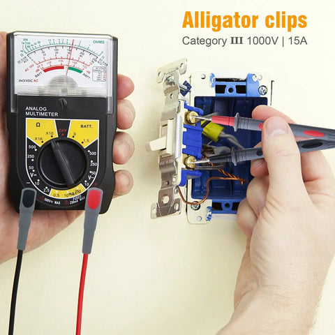 Hands using Soft Silicone Test Lead Kit With Threaded Safety Alligator Clips on a wall socket with multimeter, compatible with Fluke, AstroAI, KAIWEETS, Innova
