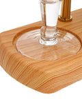 Close-up of the wooden base of the Royal Belgian Siphon Coffee Maker In Gold Retro Siphon Brewer For Rich Clean Tasting Coffee Easy Pour.