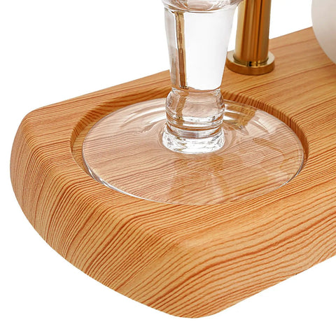Close-up of the wooden base of the Royal Belgian Siphon Coffee Maker In Gold Retro Siphon Brewer For Rich Clean Tasting Coffee Easy Pour.