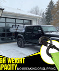 Auto Retractable Ratchet Straps 1 Inch By 12 Foot 1760 Pound Break Strength Four Pack Neon Green Tie Downs securing truck in snow