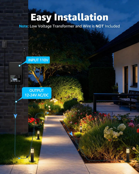 Low Voltage Landscape Lighting Kit With Eight Path Lights And Four Spotlights illuminating garden path; transformer shown.