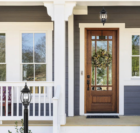 Front porch with Three Light Outdoor Post Lantern in Textured Black and Clear Beveled Glass Panels, 21 Inch Tall, UL Wet Rated classic fixture.