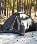 Canopy Water Weight Bags Four Pack Total 88 Lbs, Leak Proof Tent Weights for Gazebo Pop Up Canopies around a tent in forest