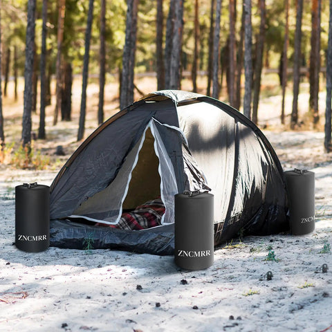 Canopy Water Weight Bags Four Pack Total 88 Lbs, Leak Proof Tent Weights for Gazebo Pop Up Canopies around a tent in forest