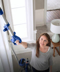 Woman using Total Home Pet MaxLife Upright Vacuum For Pet Hair, Cleans Carpet To Hard Floors, Multi Floor Cleaning