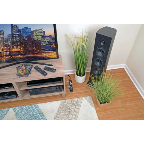 Room setup with TV and Six Outlet Surge Protector Power Strip with Six Foot Cord Black No Brainer Lifetime Guarantee And Ten Thousand Insurance Coverage for Home And Office Gear behind TV stand