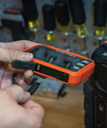 Person holding Rechargeable Pro Thermal Imaging Camera With Over 76800 Pixels For Clear Heat Spots And Signatures Wi Fi Data Transfer Three Palettes Accurate High And Low Temperature Points Easy Image Capture And Seamless Sharing, showing USB port.