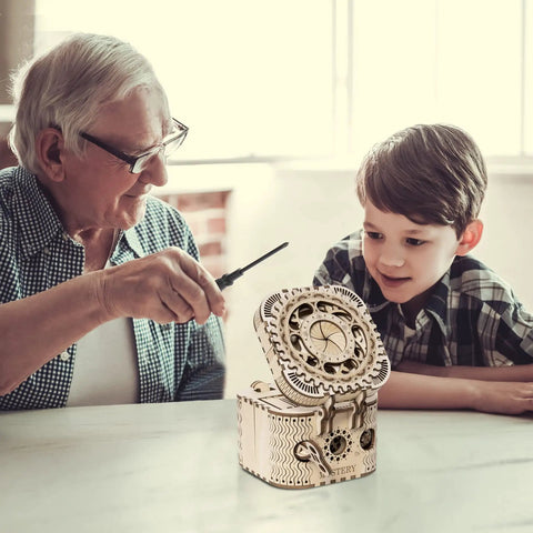 3D Wooden Puzzle Password Box Kit For Adults And Teens With A Hidden Combination Lock Mechanism Laser Cut Wood No Glue Required Clear Instructions: man and boy assembling wooden puzzle box