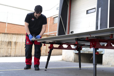 Heavy Duty Adjustable Tile Table For Large Format Ceramic Sheets Extending 43 To 59 Inches being used by a contractor.