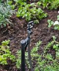 Adjustable Flow Micro Sprinkler With Full Circle Rotary Spray For Drip Irrigation Systems 10-32 Inlet in garden setting