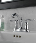 Linden Centerset Chrome Bathroom Faucet With Diamond Seal Technology And Metal Drain on a white vanity sink