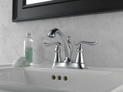 Linden Centerset Chrome Bathroom Faucet With Diamond Seal Technology And Metal Drain on a white vanity sink
