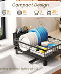 Space Saving Dish Rack For Small Kitchens With Utensil Holder And Drainboard, Angled Drainer In Stainless Steel, Holds Up To 10 Plates And Bowls, Plus Cups, Compact 15 L X 11 W X 5.9 H Black Finish shown on countertop next to sink.
