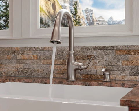 High Arc Kitchen Faucet With Pull Down Sprayer And Soap Dispenser, Single Handle, Spot Defense Stainless Finish, installed view by window