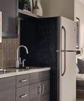 Precept Single-Handle Kitchen Faucet With Side Sprayer In Chrome, 360 Degree Swivel, modern kitchen setup view.
