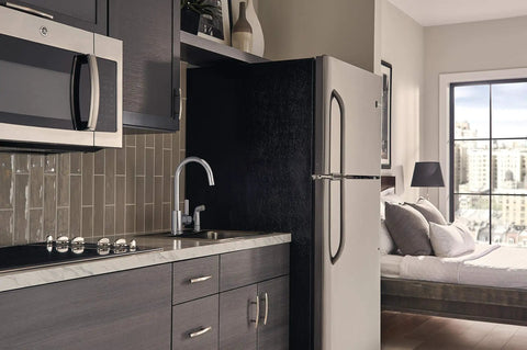 Precept Single-Handle Kitchen Faucet With Side Sprayer In Chrome, 360 Degree Swivel, modern kitchen setup view.