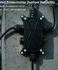 IP65 Waterproof Outdoor Junction Box With Cable Glands For Lever Nut Connectors mounted on concrete