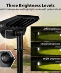 Close-up of Solar Landscape Spotlight Kit With 32 LED Outdoor Wall Lights IP65 Waterproof 4 Pack showing brightness levels.