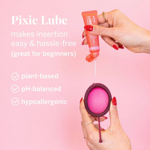 Pixie Lube being applied to Menstrual Disc Starter Kit With Medical Grade Silicone All Inclusive Set Includes Medium And Large Discs Applicator Lube Wash Sterilizing Carry Cup And Wipes For A No Mess Tampon Alternative Period Care