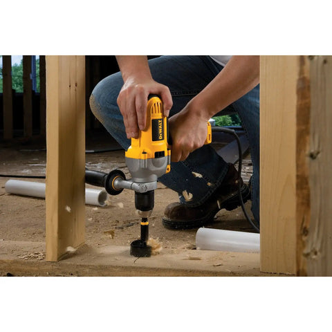 Worker using Corded Drill Powerhouse With 1/2-Inch Chuck, 10 Amp Motor, Mid Handle Grip, in a construction setting.