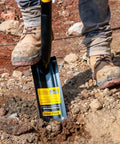 TruPro California Trenching Shovel with 4 Inch 13 Gauge Steel Blade and 48 Inch Fiberglass Handle in use on soil