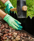 Installing No Dig Interlocking Garden Edging Kit 40 Piece 20 Ft Long 5 Point 3 In Tall Plastic Landscape Border with a mallet