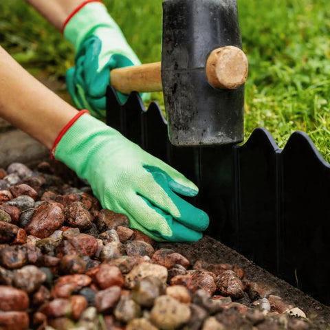 Installing No Dig Interlocking Garden Edging Kit 40 Piece 20 Ft Long 5 Point 3 In Tall Plastic Landscape Border with a mallet
