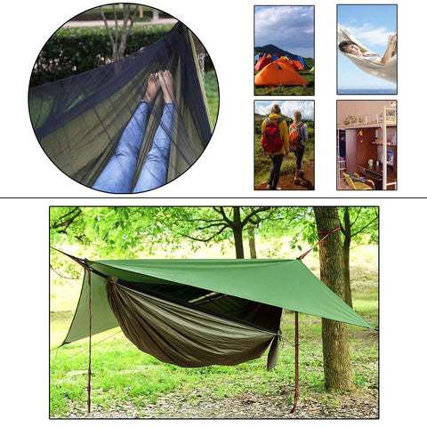 Double Parachute Nylon Camping Hammock Set With Rain Fly Tarp Mosquito Net And Tree Straps Lightweight Dope Gear For Backpacking Hiking Travel And Outdoor Yard Fun set up in a forest.