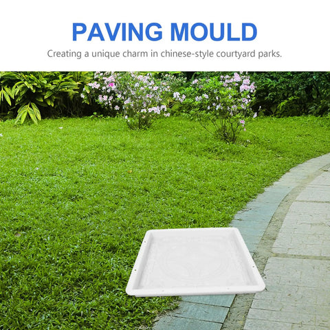 Path Maker Paver Mold For Garden on grass near a stone path, reusable design for antique walkways, durable white plastic