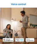 Couple using Lit Smart Light Bulbs 2 Pack Color Changing A19 LED 60W Equivalent with voice control in living room.
