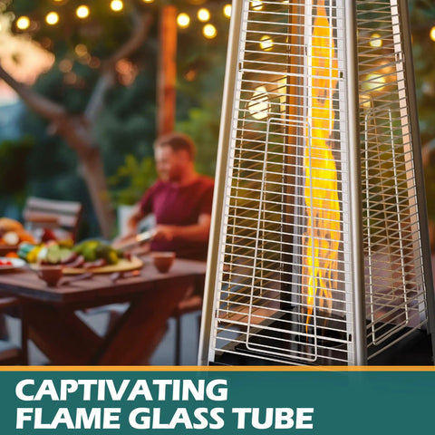 Backyard Hangout Ready 48,000 BTU Pyramid Flame Patio Heater with glass tube and black finish next to outdoor dining setup.