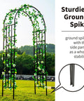 Sturdy Black Wrought Iron Pergola Arbor Garden Arch With Ground Spikes 100 Inches High And 45 Inches Wide Outdoor Climbing Plants Trellis For Weddings Parties And Patio Decor shown in a grassy outdoor setting.