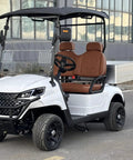 Pull Up In Style With This Badass Two Seater Golf Cart Featuring A Rock Solid Aluminum Cargo Bed 48V Lithium Battery Epic 4Kw Motor Sweet Directional Handling And Vibrant Yellow Paint For Total Neighborhood Dominance, showcasing a white two-seater with brown seats.