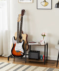 Vintage Brown Guitar Amp Stand With Double Rack For Acoustic Electric Bass And Ukulele Storage Holder beside two guitars and amp.