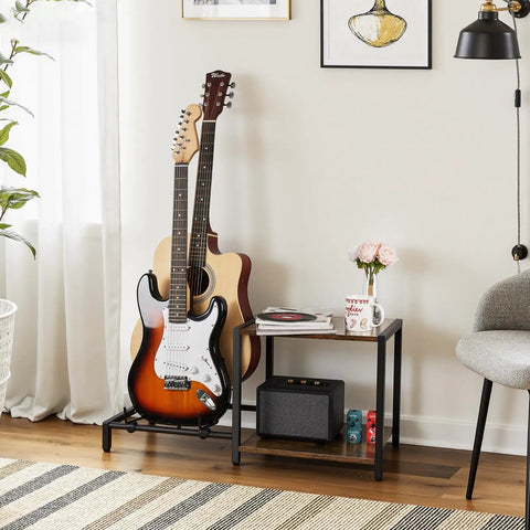 Vintage Brown Guitar Amp Stand With Double Rack For Acoustic Electric Bass And Ukulele Storage Holder beside two guitars and amp.