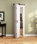 Two Panel Bifold Barn Door Set 30 By 84 Inches With Hollow Core MDF Molded Panels Primed Surface Ready To Paint Includes 2.83-Foot Hardware Kit For Easy Install Sliding Doors Double 15 Inch Panels DIY Friendly installed in room