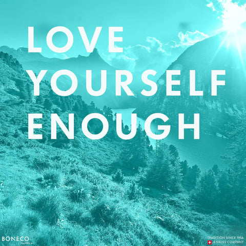 Scenic mountain landscape with 'Love Yourself Enough' message, promoting self-care and wellness.