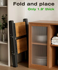 Two Step Foldable Aluminum Stool With Slim Black Woodgrain Finish For Indoor Tasks Handy Lightweight Workhorse For Tight Closets And Behind Furniture Easy Compact Storage folded to 1.9 inches thick beside cabinet
