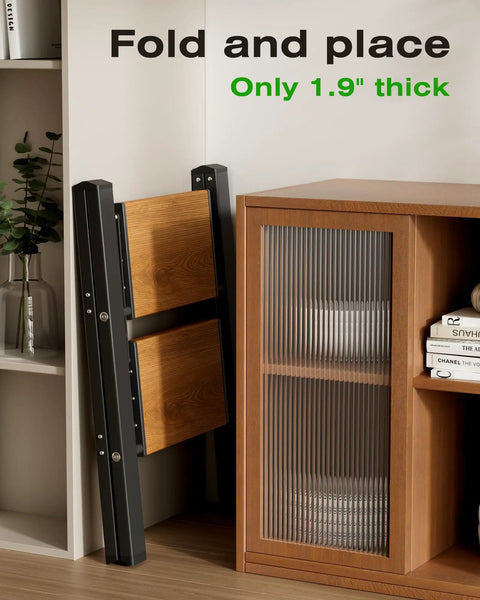 Two Step Foldable Aluminum Stool With Slim Black Woodgrain Finish For Indoor Tasks Handy Lightweight Workhorse For Tight Closets And Behind Furniture Easy Compact Storage folded to 1.9 inches thick beside cabinet