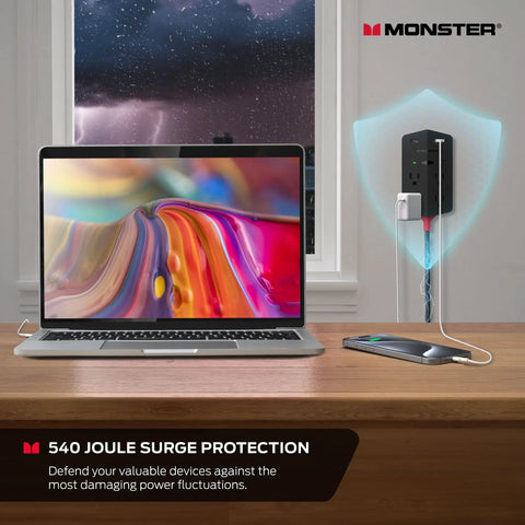 Power Shield XL Surge Protector with Outlet Extender 4 Grounded AC Outlets and 2 USB A Ports on wall, powering laptop and phone